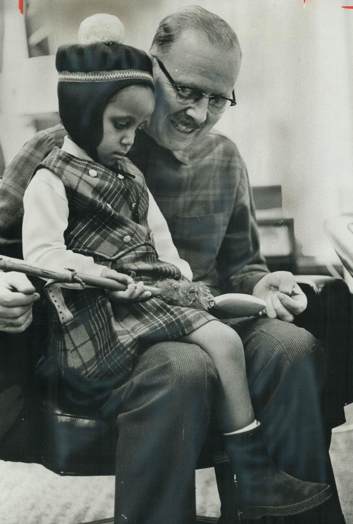 Mayor meets Princess. Mayor William Dennison holds 6-year-old Menen, daughter of Prince Raf Mangashia Seyoum, governor general of Tigrai province, Eth(...)