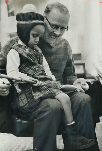 Mayor meets Princess. Mayor William Dennison holds 6-year-old Menen, daughter of Prince Raf Mangashia Seyoum, governor general of Tigrai province, Eth(...)