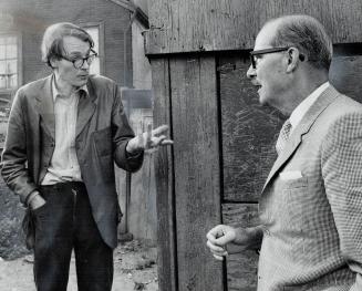 Lawyer John Sewell (left) argues with Mayor William Dennison over last night's clean-up of little Trefann Park by the Young Men' Canadian Club. Sewell(...)