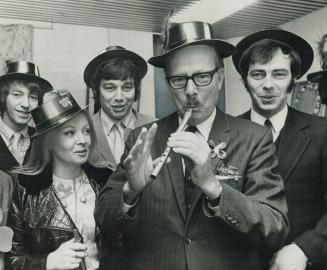 Mayor tootles for St. Pat. It was St. Patrick's Day and Mayor William Dennison got his Irish up enough to don a shamrock-green hat and trill an Irish (...)