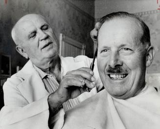 Louis the barber gives a final haircut to Mayor William Dennison, a friend since 1933