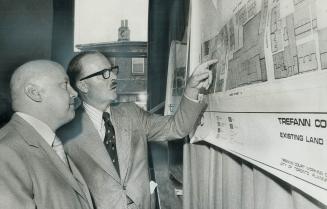 Ottawa's new housing proposals provide new approaches to urgent problems, says Ron Basford, urban affairs minister, left, shown with Mayor Bill Dennis(...)