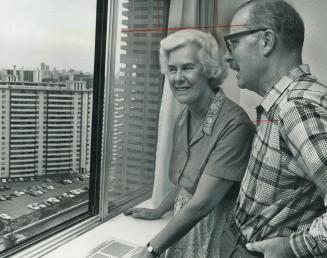 East York's Leaside Tower in Thorncliffe Park, Toronto Mayor William Dennison and his wife stand by the window