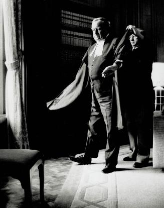 Brian Dickson, chief justice of the Supreme Court of Canada, donned robes for the last time last week, aided by court attendent Lou Lefebvre. Yesterda(...)