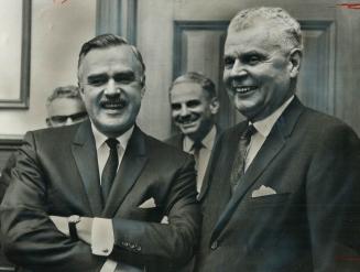 Optimism and glee about the coming federal election are radiated by Premier John Robarts and Opposition Leader John Diefenbaker at their pre-campaign (...)