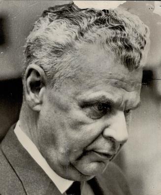 Dejected Prime Minister Diefenbaker, whose P