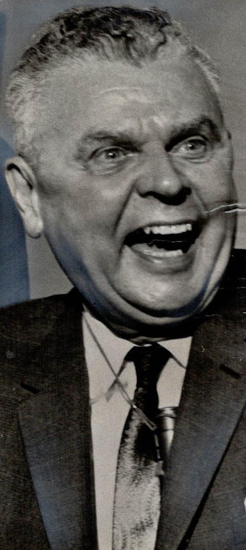 Alternately outraged and amused, Opposition Leader John Diefenbaker attacked Prime Minister Pearson at a press conference in Toronto today for pussy-f(...)