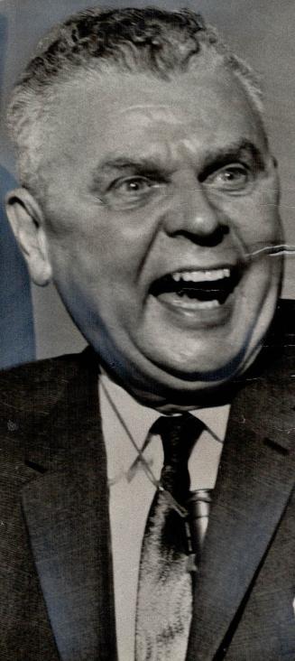 Alternately outraged and amused, Opposition Leader John Diefenbaker attacked Prime Minister Pearson at a press conference in Toronto today for pussy-f(...)