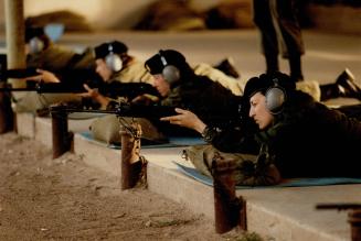Where's the target? Sighting with the wrong eye is no help at all on the rifle range, and hauling around an 11-pound FNC1 gas-operated semi-automatic (...)