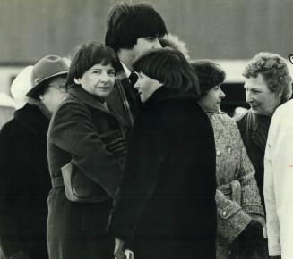 Final farewell. The three surviving Dionne Quintuplets. (left to right) Yvonne, Annette and Cecile, now 45, stood expressionless during the funeral of(...)