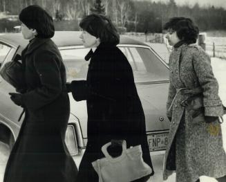 A rare photo of remaining quints - Yvonne, Annette, Cecile - at 1979 funeral of father