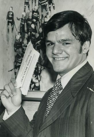 Wings Land Dionne. Junior scoring whiz Marcel Dionne shows his first pro hockey contract, signed today with Detroit Red Wings. Dionne, who led OHA by (...)
