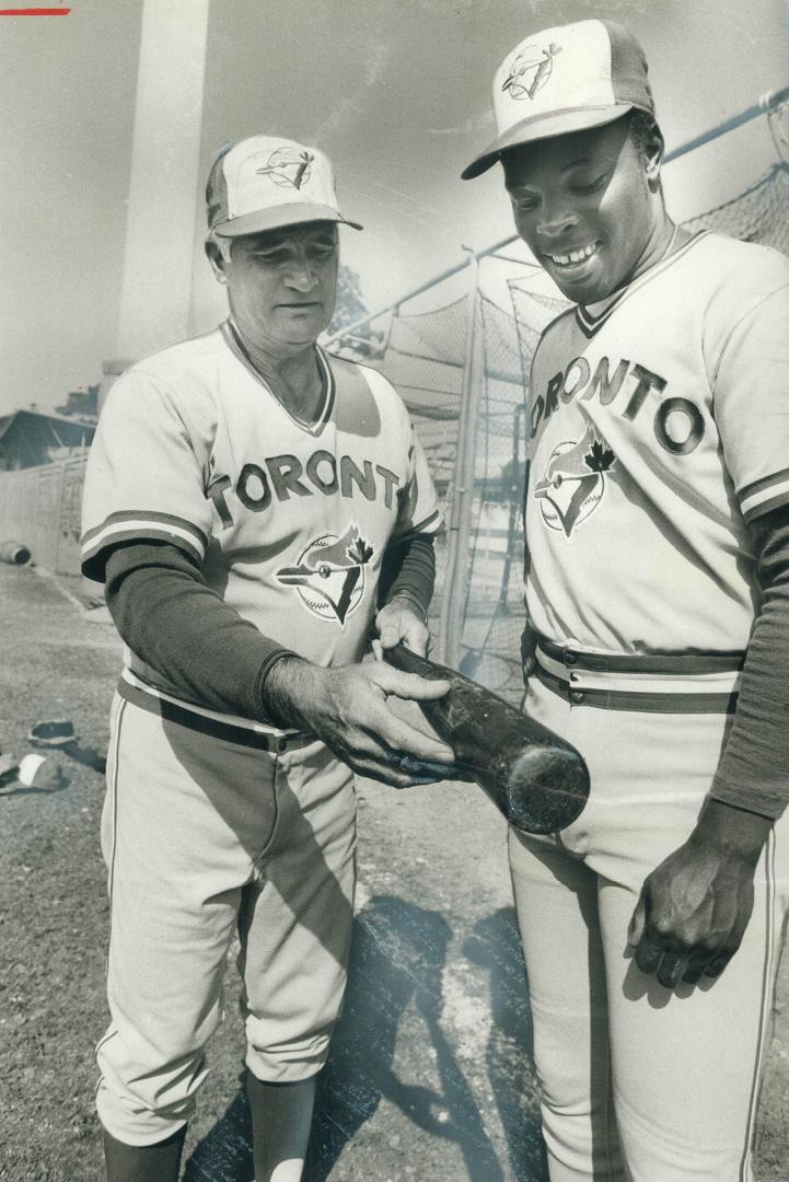 Advice pays off. Toronto Blue Jays' bating instructor Bobby Doerr (left)  had timely tips for outfielder Alvis Woods before Jays took field against  Chi() – All Items – Digital Archive : Toronto Public Library