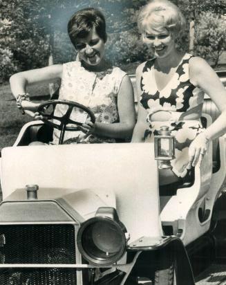 Stabbing Victim Yvonne Dorion. Riding in antique car with Marilyn Rowe (right)
