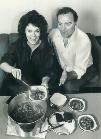 Final act: Actress Douglas serves soup that's cooked 7 hours to her director, Tom Kerr