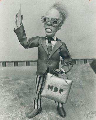 Tommy Douglas of the NDP. Puppet maker puts him in striped trousers