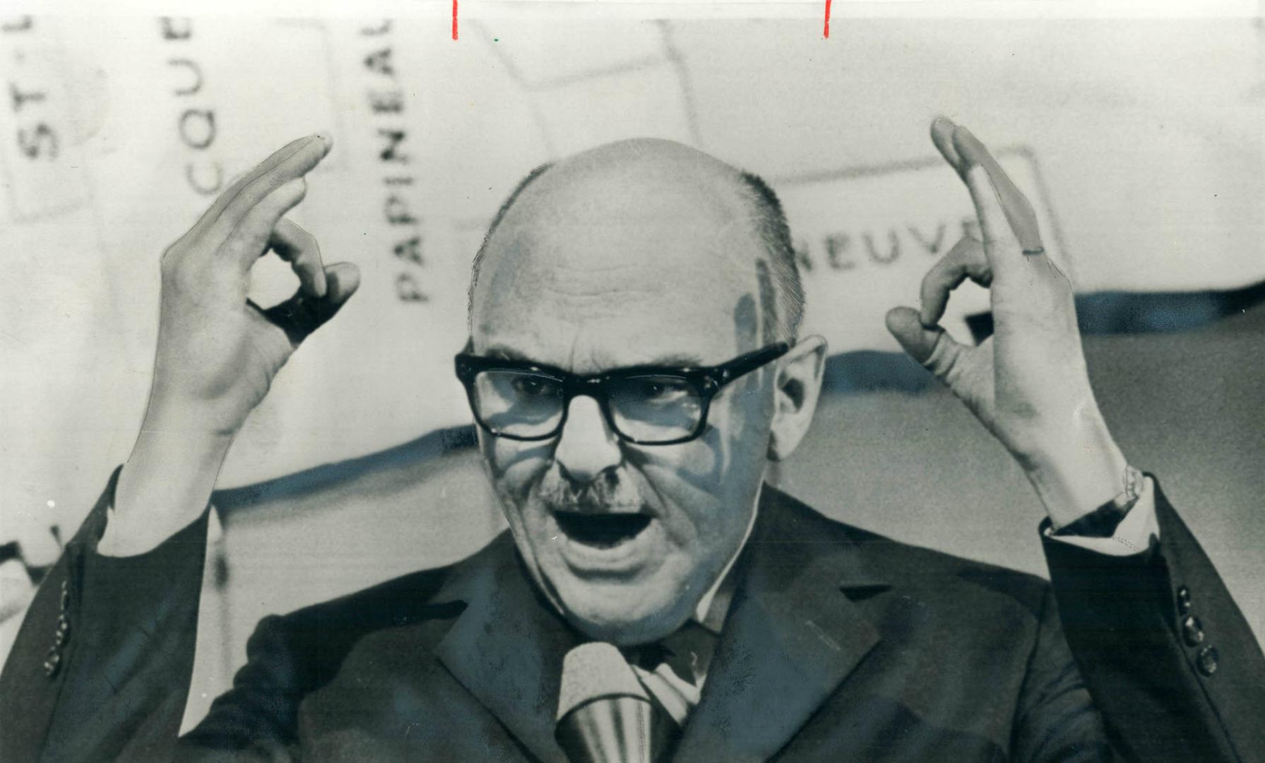 His victory is double-ok with him, Montreal's Mayor Jean Drapeau signifies as he gestures during his speech after his Civic Party made a clean sweep i(...)