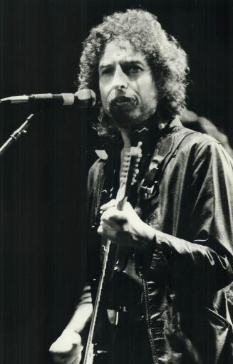 Big plans: John F. Bassett is hoping to procure Bob Dylan and John Lennon to make a movie with him