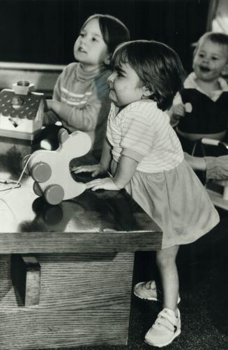 Lindsay takes a stand. Lindsay Eberhardt, almost 3, delighted her parents yesterday by standing on her own two feet for the first time in her life. Th(...)