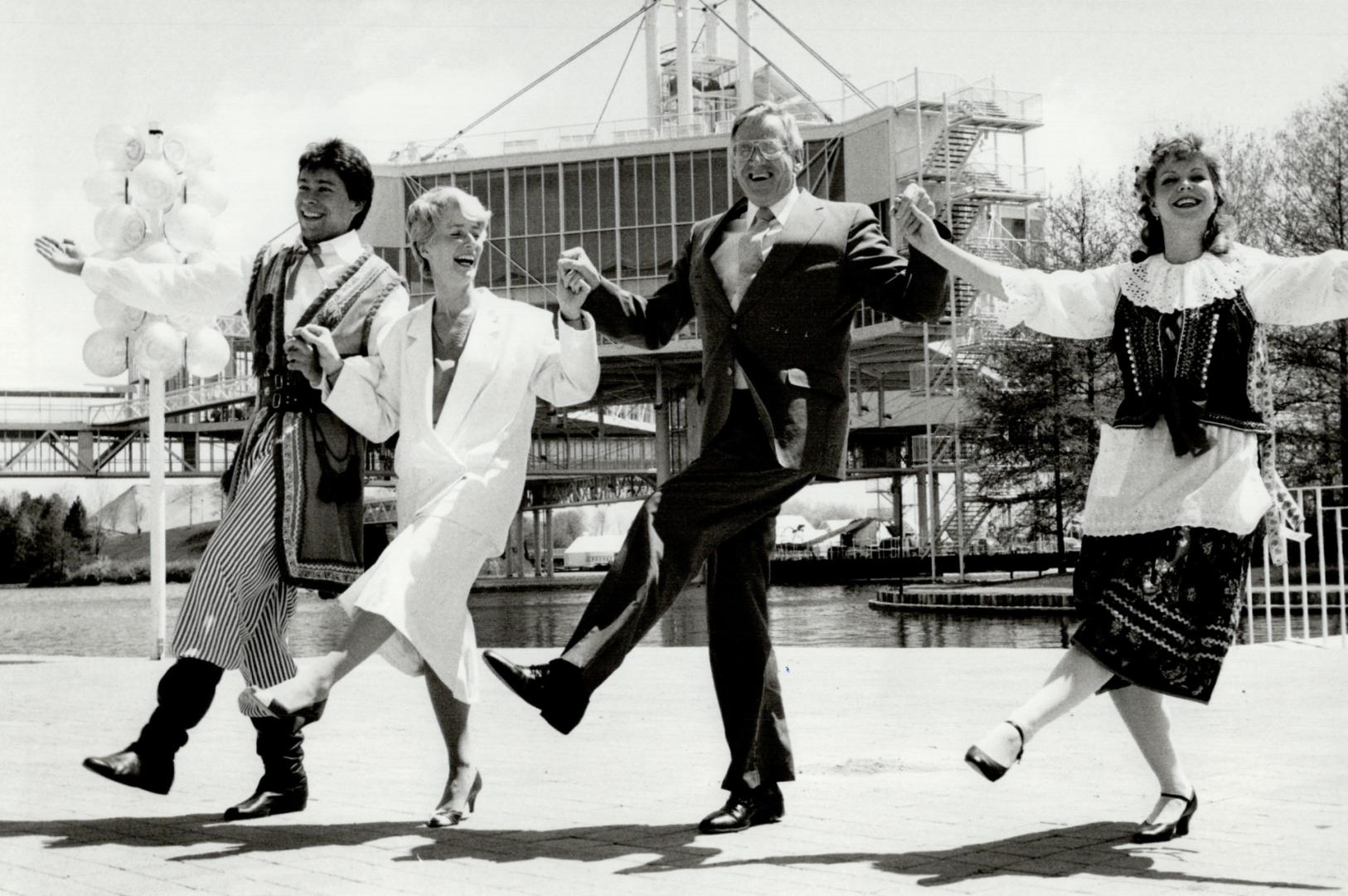 It's the Ontario Place polka. Polish dancers Ron and Barbara Szabunia, in traditional costume, join Minister of Citizenship and Culture Lily Munro and(...)