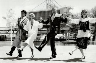 It's the Ontario Place polka. Polish dancers Ron and Barbara Szabunia, in traditional costume, join Minister of Citizenship and Culture Lily Munro and(...)