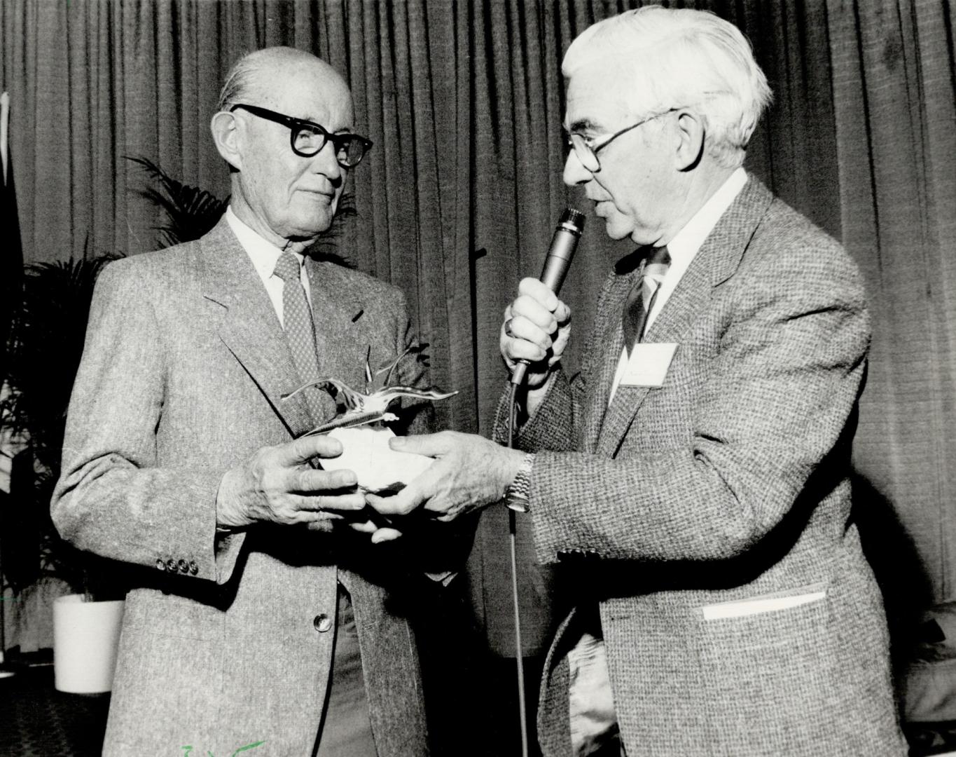 Star's Milt Dunnell honored. Milt Dunnell, left, veteran Star sports columnist who turned 80 last Christmas Eve, was given a presentation at last nigh(...)