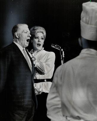 Nelson Eddy and Gale Sherwood. Royal York hotel chef watches them rehearse