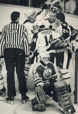 Some homecoming: Ex-Leaf goalie Don Edwards, looking to become the Oilers' backup netminder, was beaten cleanly as new Leaf Al Second (20) opened the home club's scoring last night