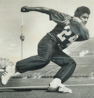 New Argo hopeful Jim Edwards shows some of his vaunted speed druing workout at CNE Stadium yeterday