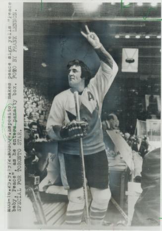 Phil Esposito. A peace sign in penalty box