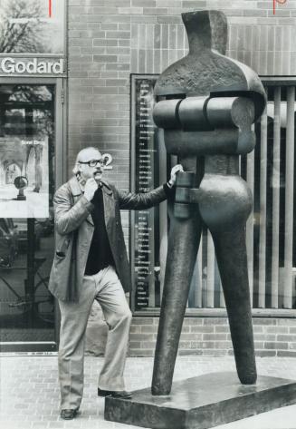 Sorel Etrog's walking figure, called Pieton, is from a big selection of the sculptor's new marbles, bronzes and charcoal drawings on display at the Ma(...)