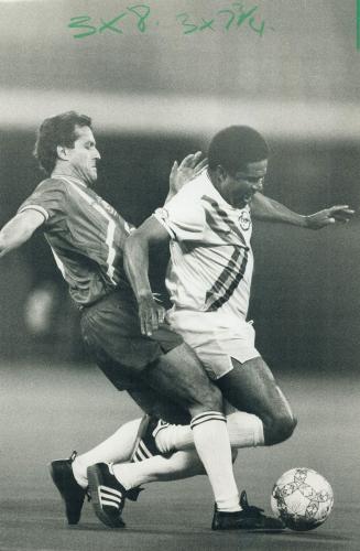 That hurts! Famed international star Eusebio, who led Toronto Metros-Croatia to a 1976 title, is brought down painfully by Italian midfielder Francesc(...)