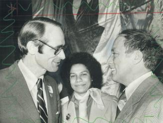 A surprise visitor, Prime Minister Pierre Trudeau congratulates Dr. John Evans (left) on winning Liberal nomination in Rosedale riding last night. Mor(...)
