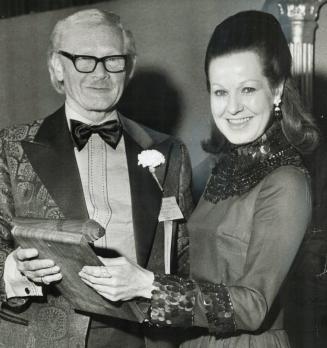 Star fashion writer Stasia Evasuk receives special award won by the Toronto Star for superior coverage of men's fashion news last night at gala dinner(...)