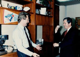 Toronto Mayor Art Eggleton, left, laughs with Richard Berkeley, his Kansas City counterpart