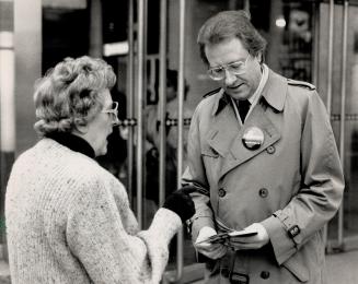 Doing some last-minute campaigning at Yonge St