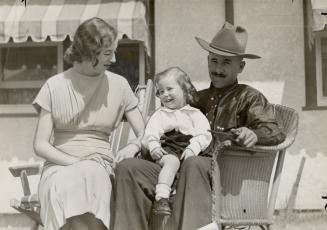 The Earl of Egmont, Canadian farmer who inherited a title and estates in England, is again living happily on his farm near Calgary. In the above pictu(...)