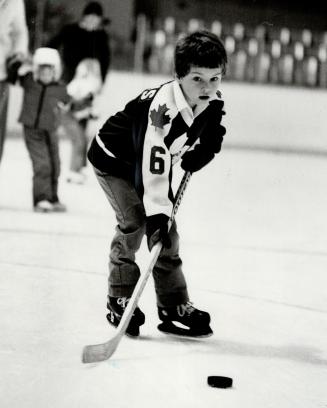 Chip off the old block: If No. 6 looks familiar, it's because the young man at the Leafs' Christmas party is Ron Ellis Jr., who is sporting the same number as his father, Leaf veteran Ron Ellis