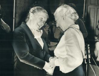The first woman cabinet-minister in Canada's history, Ellen Fairclough (right), laughs with Lieutenant-Governor Pauline McGibbon after being named one(...)