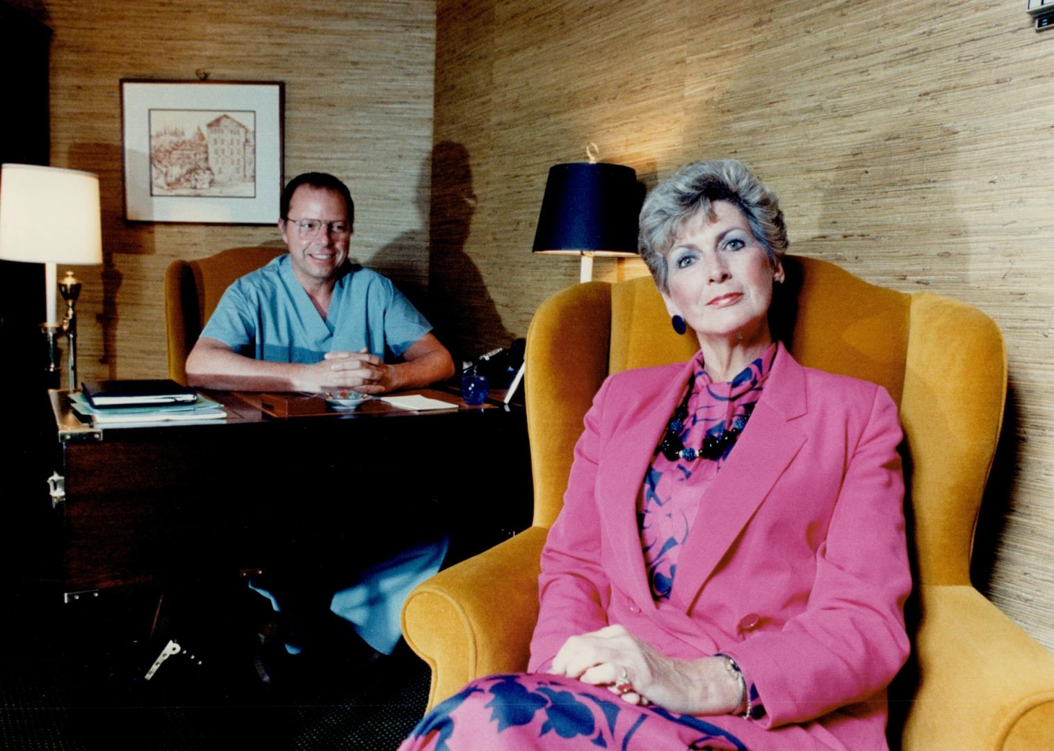 After: Dawn Hosier and Dr. Earl Farber after surgery. The pair is sitting in the doctor's Inn on the Park office. It's amazing - the change makes you feel good about yourself, Hosier says