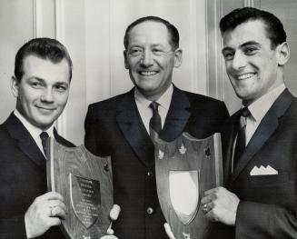 Sulky Elite honored. Gilles Lachance of Montreal (left), winner of 206 races last season, and Goderich's Ron Feagan, who hit 213 times, receive plaque(...)