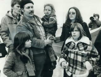 The field family, after escaped convict Wayne Cline released three of their four children, talk with reporters