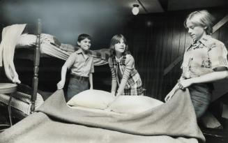 Bedmaking is just one of the chores the new arrivals from India are happy to do around the house