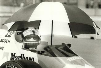 Brazilian driver Emerson Fittipaldi keeps coolafter finishing second in yesterday's qualifying session