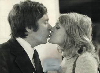 The fruits of victory for Liberal Jim Fleming, the winner in York West, are a kiss from his wife, Ilona, and an apple