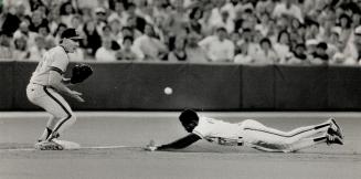 Triple Threat: Tony Fernandez was faster than a speeding bullet as he slid in with a triple before Angel Jack Howell got the ball in the fifth inning