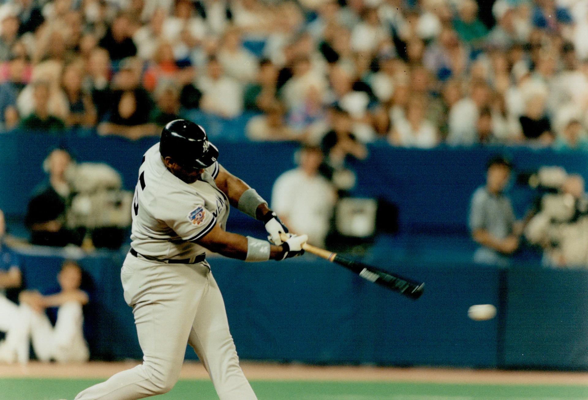 Anything you can do . . . Kelly Gruber, left, had a pair of homers for the  Blue Jays but ex-Jay Cecil Fielder countered with three of his own for the  Tigers