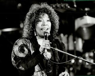 Roberta romance crowd: Roberta Flack gets caught up in the sheer essence of the music as she romances 5,000 fans at the Forum in Ontario Place