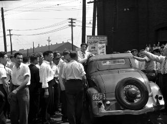 Stopping cars from entering plant, Hamilton Steel Co