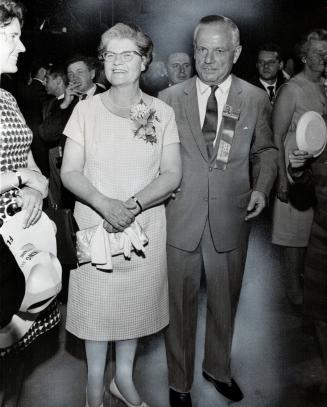 Mr. and Mrs. Donald Fleming. He'd have a bright future with that silver suit